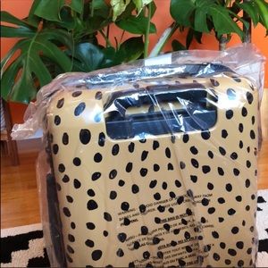 Calpak cheetah print carry-on 20 inch